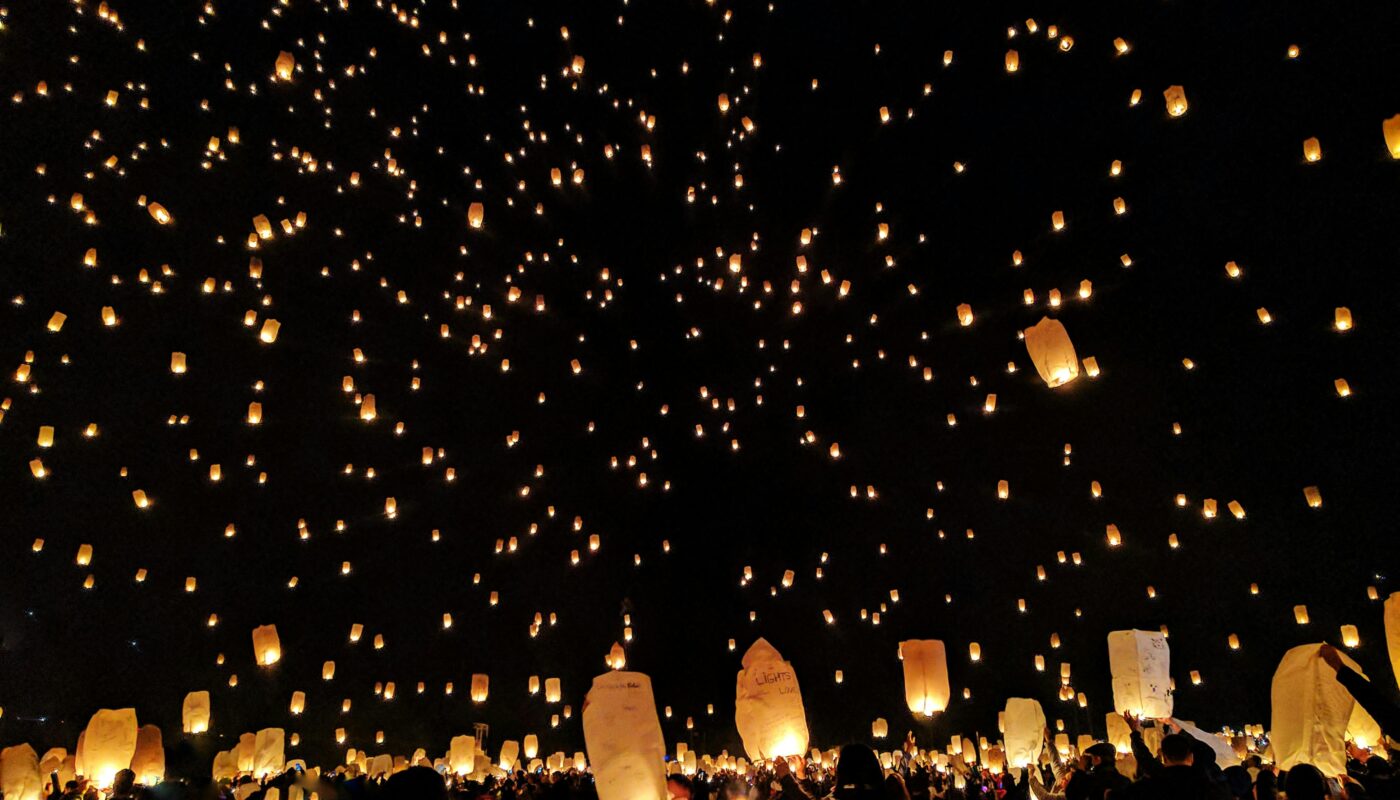 https://www.pexels.com/photo/group-of-people-throwing-paper-lantern-on-sky-during-night-431722/