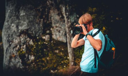 https://unsplash.com/photos/woman-in-white-shirt-taking-photo-using-black-dslr-camera-IorNTqnXGw8