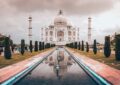 https://www.pexels.com/photo/taj-mahal-reflected-in-tranquil-pool-at-sunset-33777273/